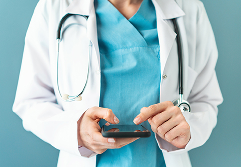 Physician using a smartphone